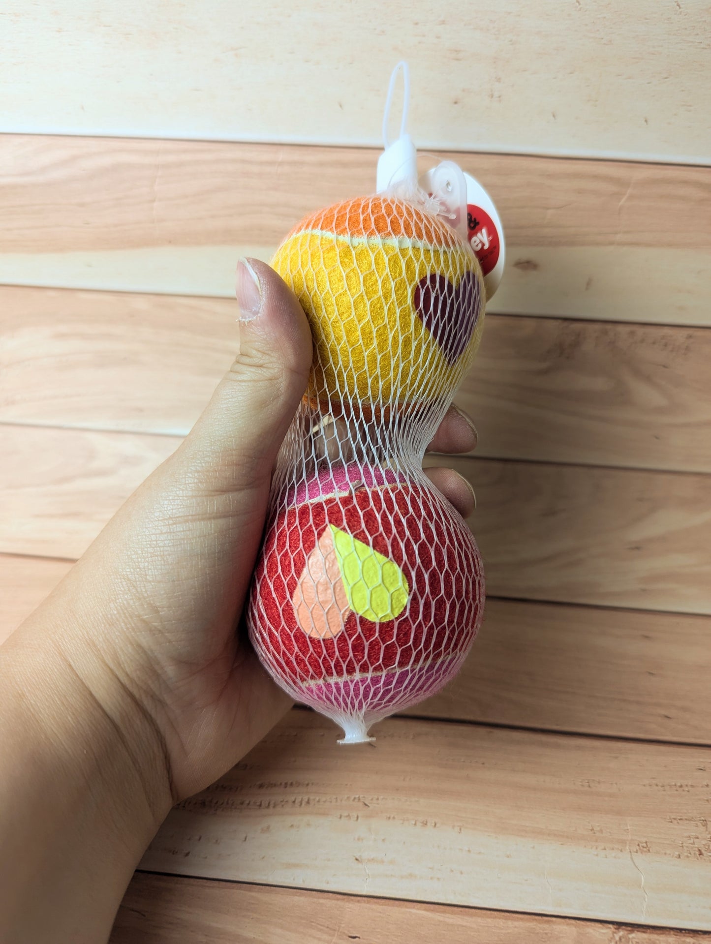 Boots and Barkley Valentine's tennis balls