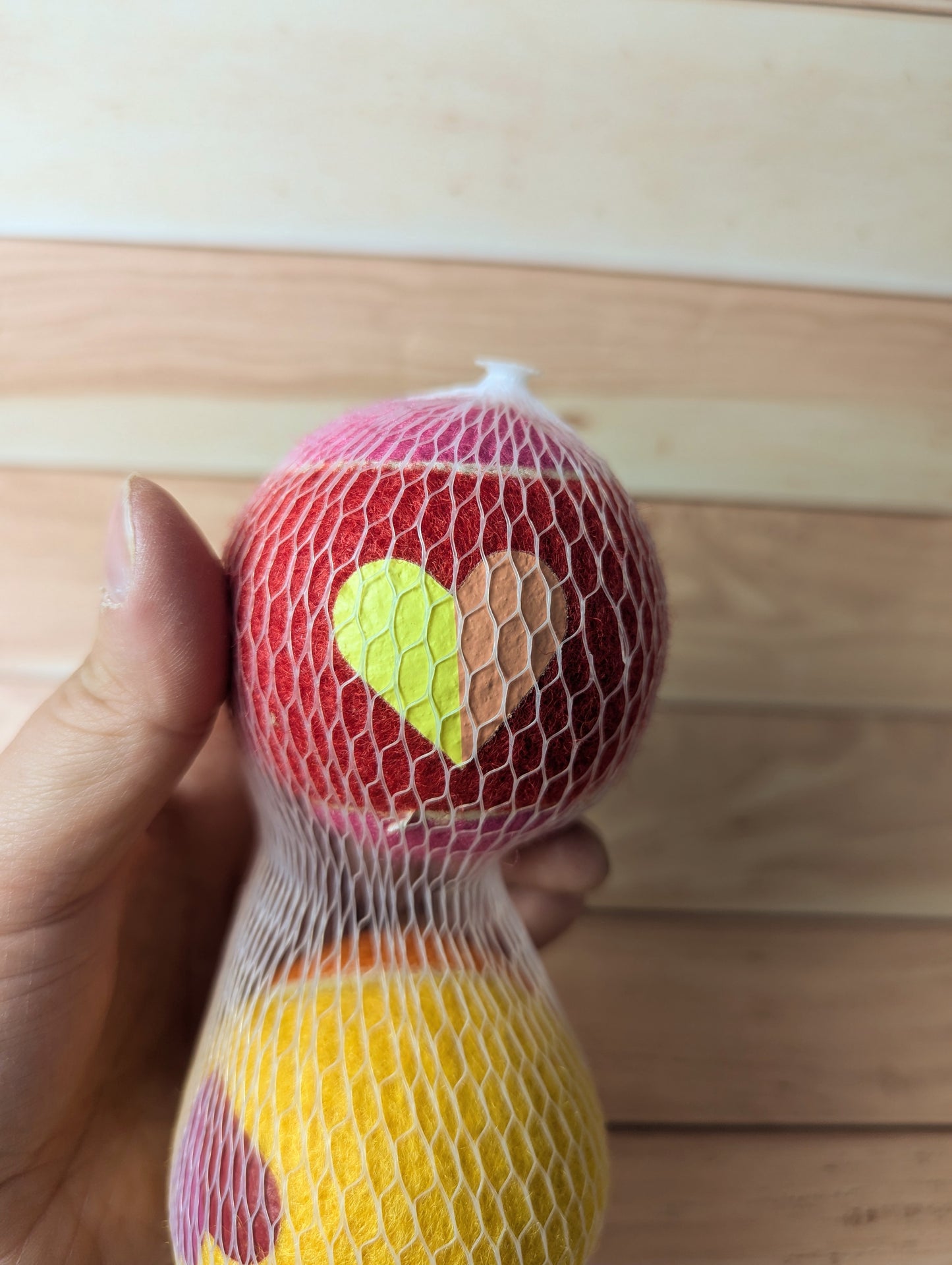 Boots and Barkley Valentine's tennis balls